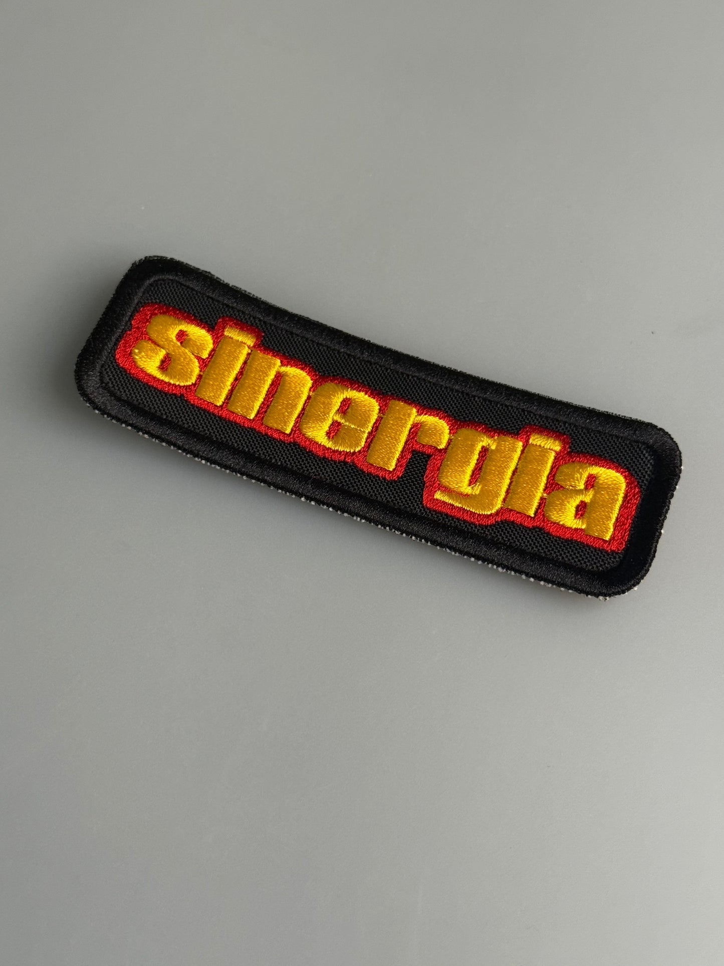 Parche bordado Sinergia